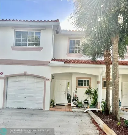 Buy this 3 bed townhouse on 9018 Hampshire Drive in Coral Springs, FL 33065