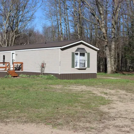 Buy this 3 bed house on 3852 East 2 Mile Road in Wilcox Township, MI 49349