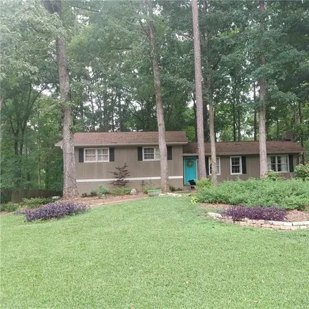 Buy this 4 bed house on 5063 Woodland Drive in Kennesaw, GA 30152