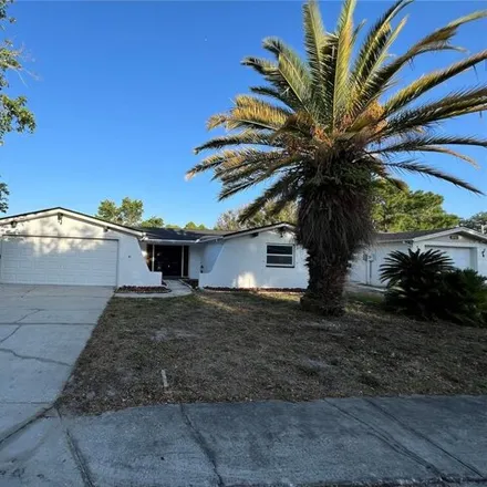 Buy this 2 bed house on 9135 Collage Ln in Port Richey, Florida