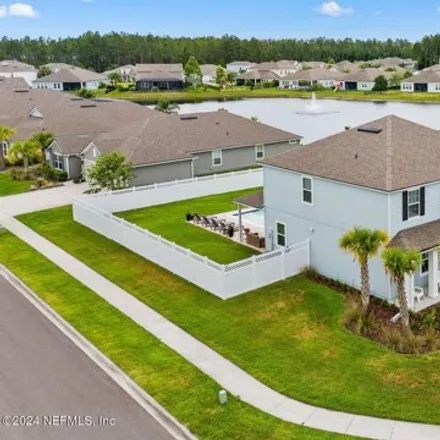 Buy this 4 bed house on Castle Trail Drive in Fruit Cove, FL 32259