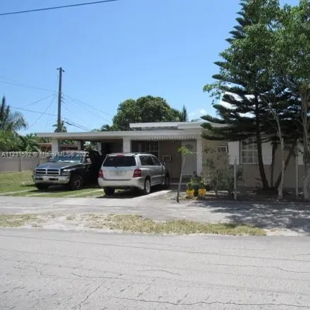 Buy this 4 bed house on 11645 Northwest 6th Avenue in Miami-Dade County, FL 33168