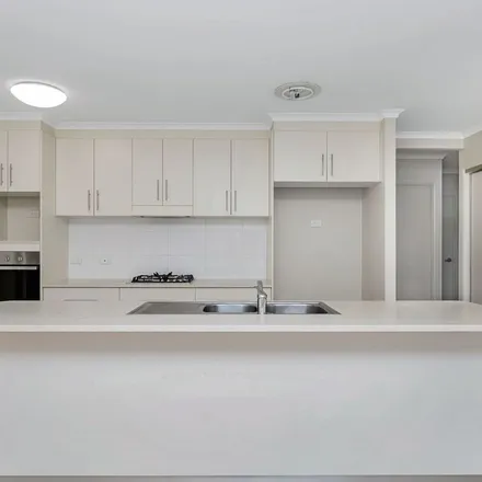 Rent this 4 bed apartment on Catho Avenue in Mount Low QLD 4818, Australia