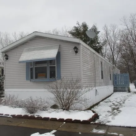 Buy this studio apartment on Circle Drive in Lansing, MI 48900