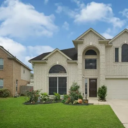 Buy this 4 bed house on 15 Palm Villas Drive in Manvel, TX 77578