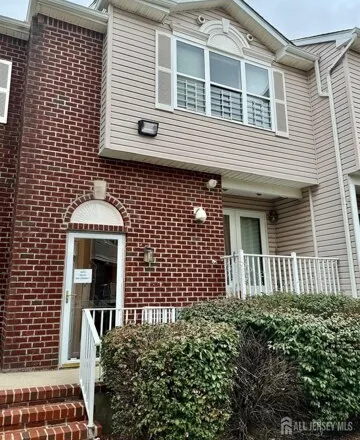 Rent this 3 bed townhouse on 410 Great Beds Ct in Perth Amboy, New Jersey