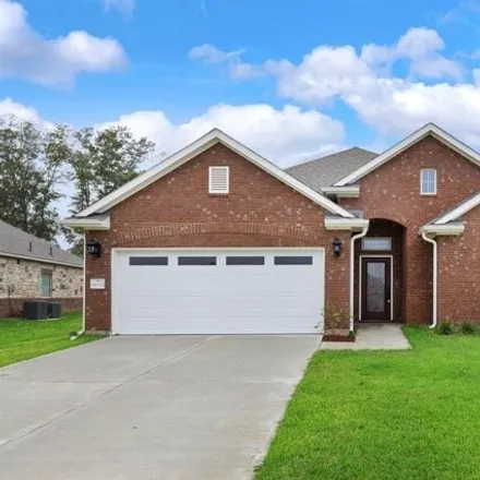Rent this 4 bed house on Alpine Aster Lane in Cleveland, TX 77327
