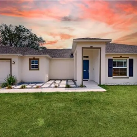 Buy this 4 bed house on 712 Cotulla Drive in Poinciana, FL 34758