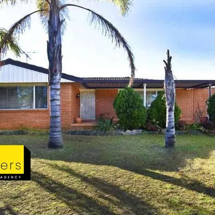 Rent this 3 bed apartment on Rimfire Close in Bossley Park NSW 2176, Australia
