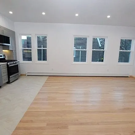 Rent this 4 bed apartment on 48-23 44th Street in New York, NY 11377