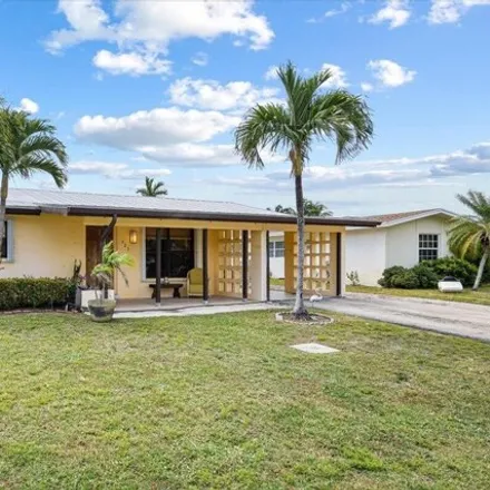 Buy this 3 bed house on 523 Riverside Dr in Palm Beach Gardens, Florida