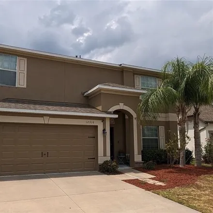 Buy this 4 bed house on 12316 Streambed Dr in Riverview, Florida
