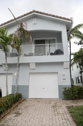 Buy this 2 bed townhouse on 3145 Laurel Ridge Circle in Riviera Beach, FL 33404