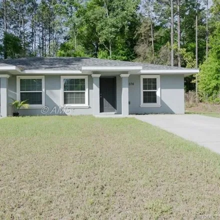 Rent this 4 bed house on 9436 North Peachtree Way in Citrus Springs, FL 34434