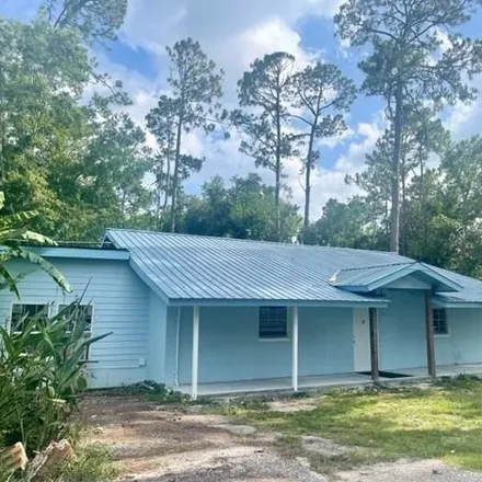 Buy this 4 bed house on 1009 East 24th Avenue in Gulf Shores, AL 36542