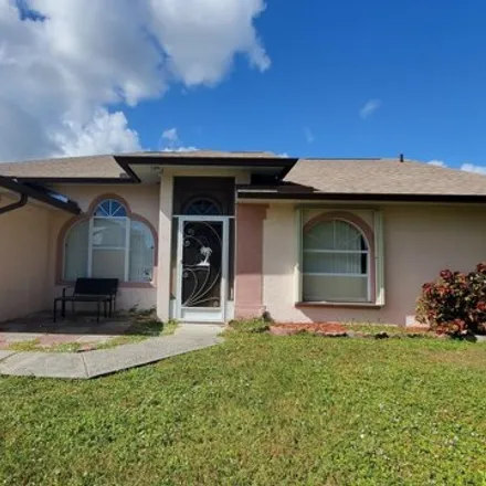 Buy this 4 bed house on 1392 Depew Street Southeast in Palm Bay, FL 32909