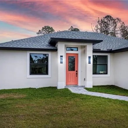 Buy this 3 bed house on 22566 Minerva Avenue in Charlotte County, FL 33954