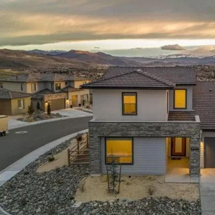Buy this 4 bed house on Fossilstone Court in Sparks, NV 98436