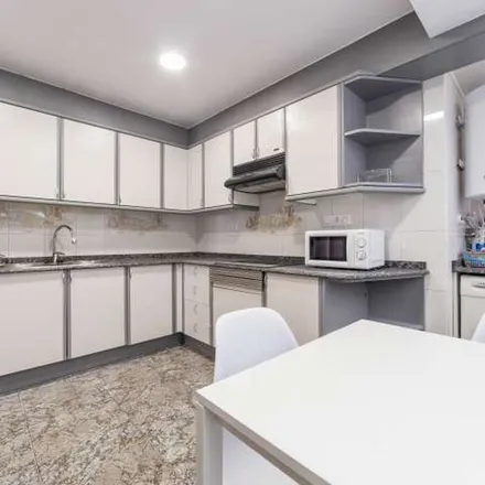 Rent this 6 bed apartment on Carrer de Rubén Vela in 46006 Valencia, Spain