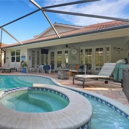 Buy this 3 bed house on 7659 Martino Cir in Naples, Florida