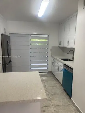 Rent this 2 bed condo on 7722 West 29th Way in Hialeah, FL 33018