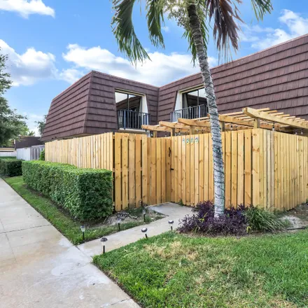 Buy this 3 bed townhouse on 1805 18th Lane in Palm Beach Gardens, FL 33418