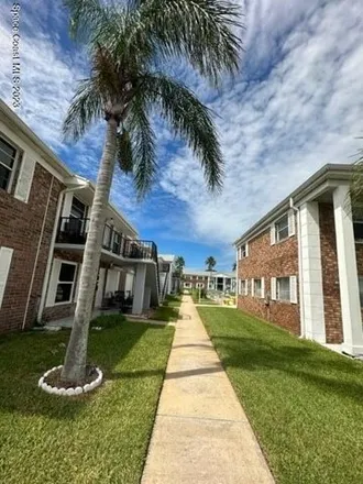 Buy this 2 bed condo on Olmstead Drive in Titusville, FL 32780