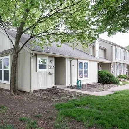 Buy this 3 bed townhouse on 12201 West 79th Place in Lenexa, KS 66215