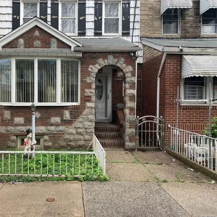 Buy this 3 bed house on 97-35 81st Street in New York, NY 11416