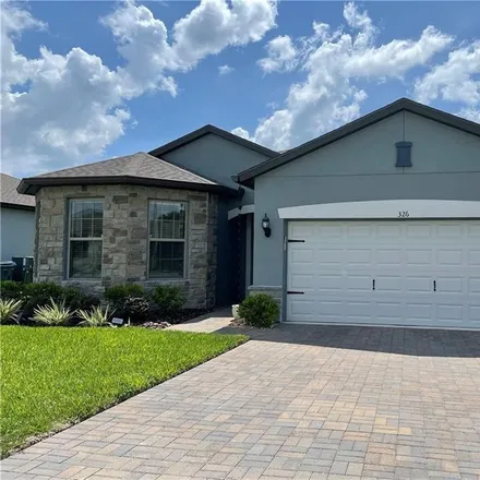 Rent this 3 bed house on Citrus Isle Loop in Davenport, Polk County