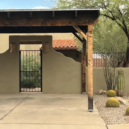 Rent this 3 bed house on 1244 North Fisher Place in Tucson, AZ 85712