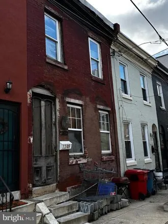 Buy this 3 bed house on 1249 North Taylor Street in Philadelphia, PA 19121