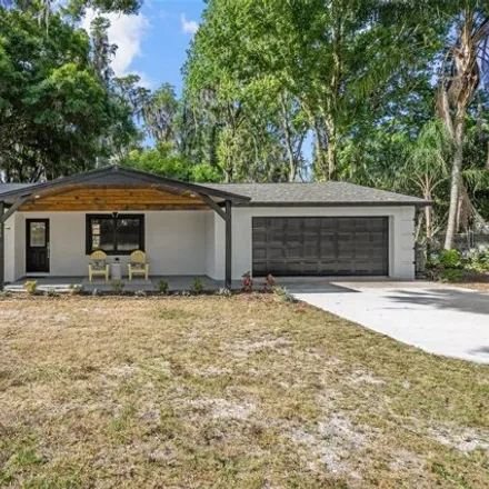 Buy this 4 bed house on 730 Crystal Lake Road in Lutz, FL 33549