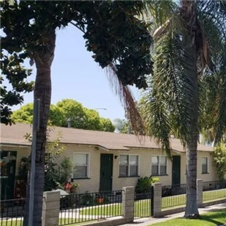 Rent this 4 bed apartment on Rhea Street in Long Beach, CA 90806