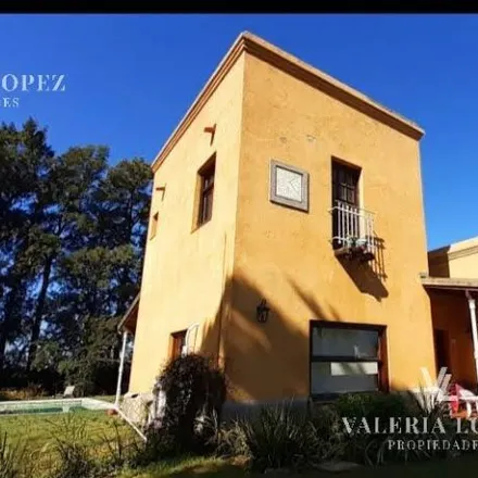 Rent this 4 bed house on Comodoro Rivadavia in La Lonja, 1669 Buenos Aires