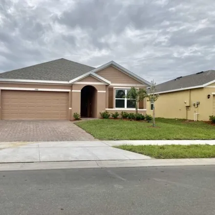 Rent this 3 bed house on Columbia Lane in West Melbourne, FL 32904