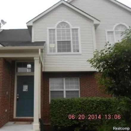 Rent this 3 bed condo on 30117 Chantal Drive in Commerce Charter Township, MI 48390
