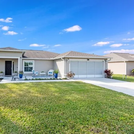 Buy this 3 bed house on 594 Delmonico Street Northeast in Palm Bay, FL 32907