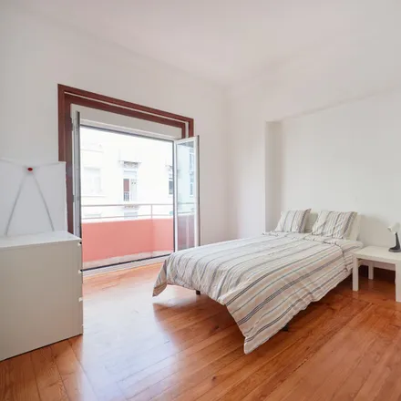 Rent this 9 bed room on Avenida Praia da Vitória 13 in 15, 1050-246 Lisbon