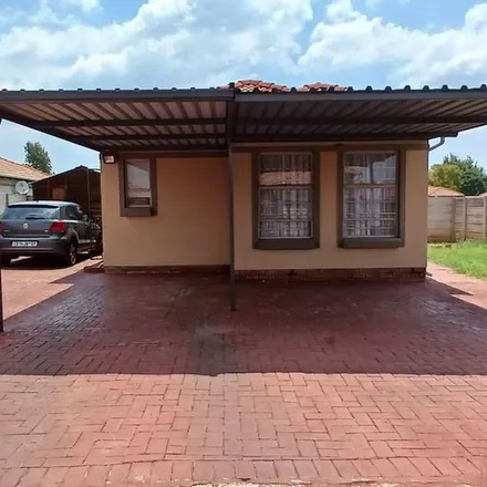 Rent this 2 bed townhouse on Alfred Boyes Avenue in Kirkney, Pretoria