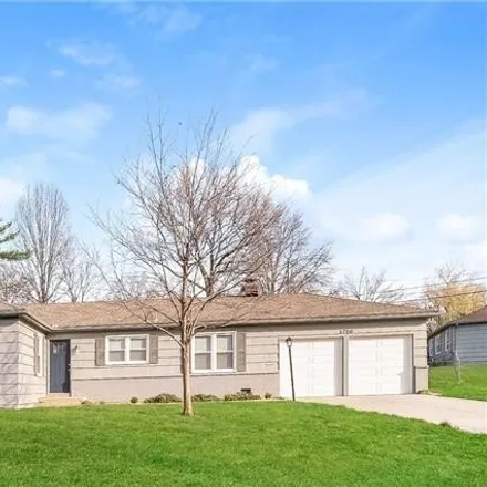 Buy this 4 bed house on 10099 Woodson Drive in Overland Park, KS 66207