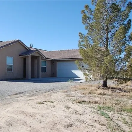 Rent this 3 bed house on 69 Eton Street in Pahrump, NV 89048