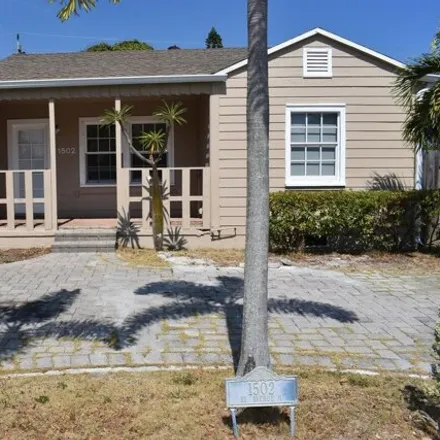Rent this 4 bed house on 1498 13th Avenue North in Lake Worth Beach, FL 33460