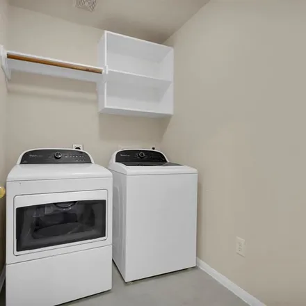 Rent this 4 bed apartment on 3943 Meadow Lilly Lane in Harris County, TX 77449