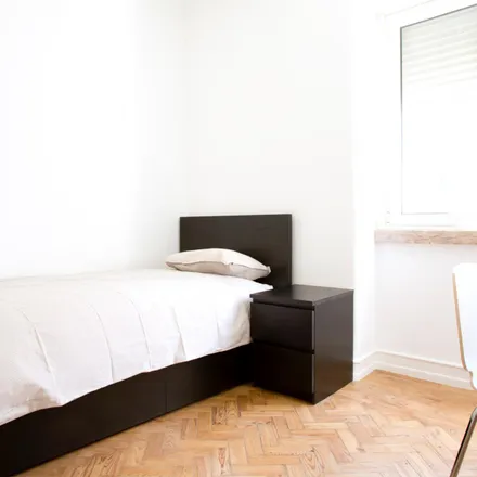 Rent this 4 bed room on Rua do Mato Grosso in 1170-379 Lisbon, Portugal