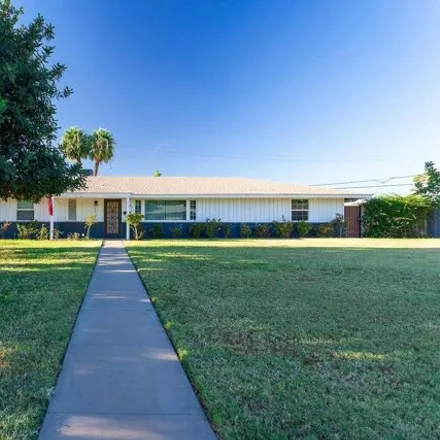 Rent this 4 bed house on 2040 West Cambridge Avenue in Phoenix, AZ 85009