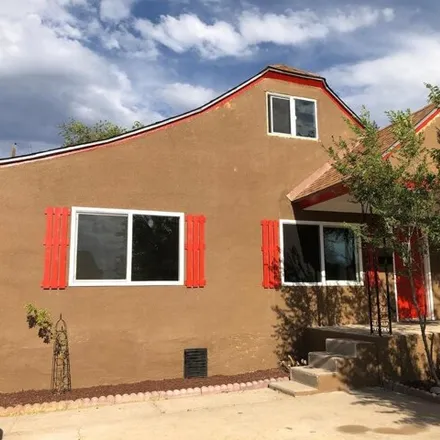 Rent this 4 bed house on 438 Grove Street Northeast in La Mesa, Albuquerque