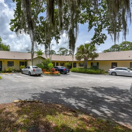Buy this 2 bed townhouse on 1672 Espanola Avenue in Holly Hill, FL 32117