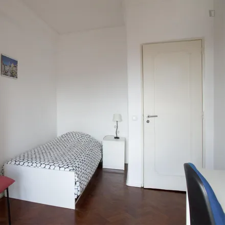 Rent this 4 bed room on Clube de Futebol Varejense in Avenida Afonso III 86, 1900-048 Lisbon