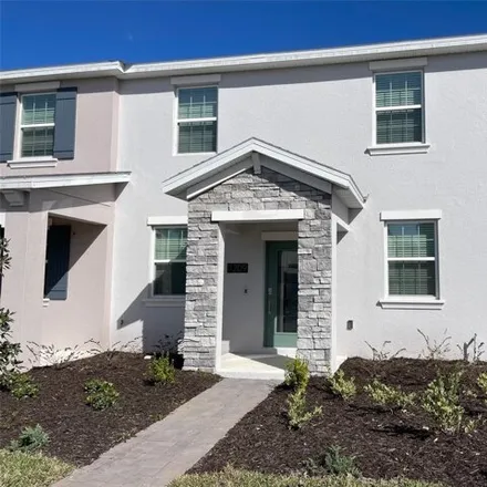 Buy this 3 bed townhouse on Listening Drive in Orange County, FL 32832